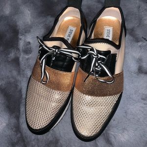 Steve Madden dress sneakers.
